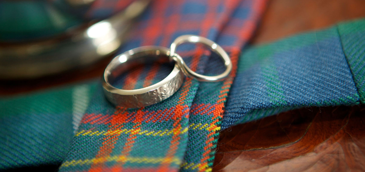 Wedding bands on tartan